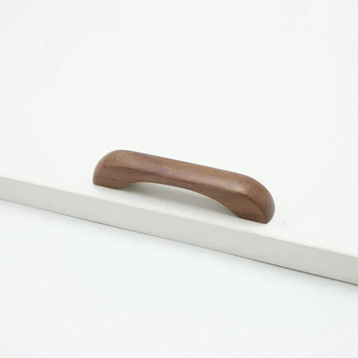 Furniture handles - Kitchen handles - Door handles - Cabinet handles - Drawer knobs - Furniture fittings - Kitchen fittings - Handles - Walnut - Wood - Wooden - Kitchen renovation - Modern - Black walnut - Bridge shape - Pitch 96mm - Walnut - Set of 4