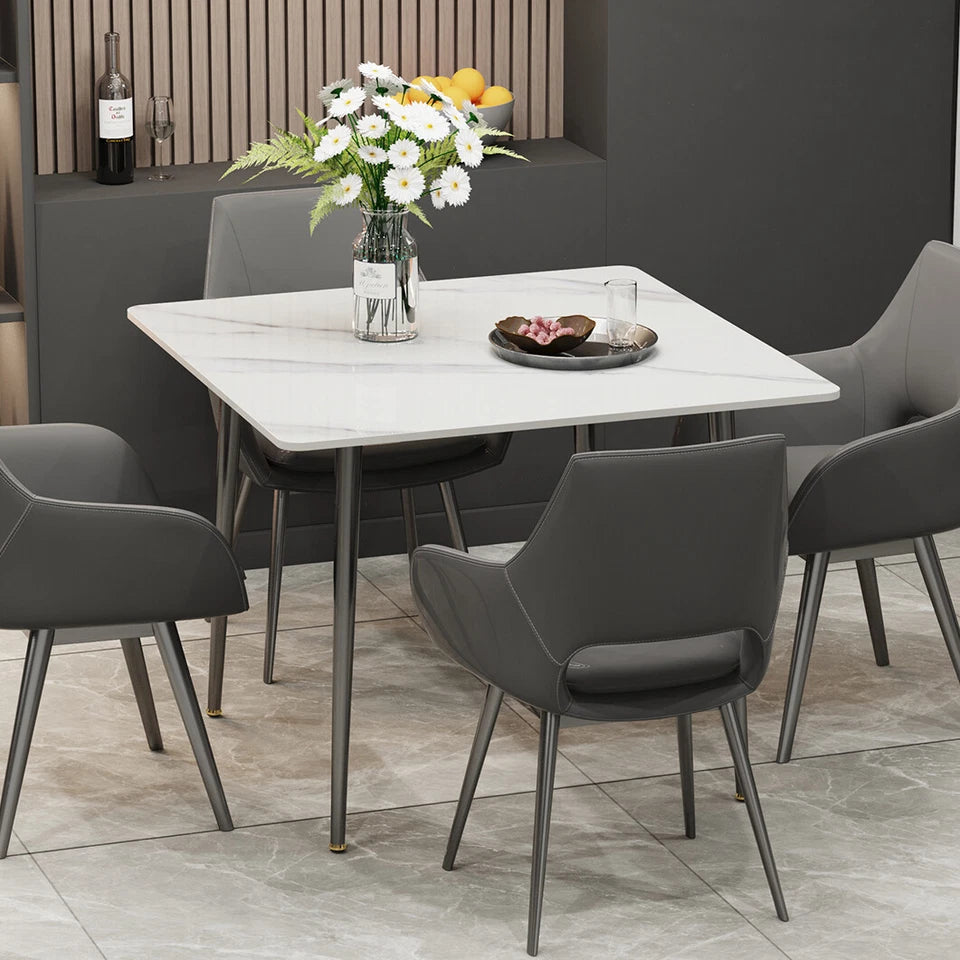 White Sintered Stone Dining Table With Black Legs For Modern Interiors